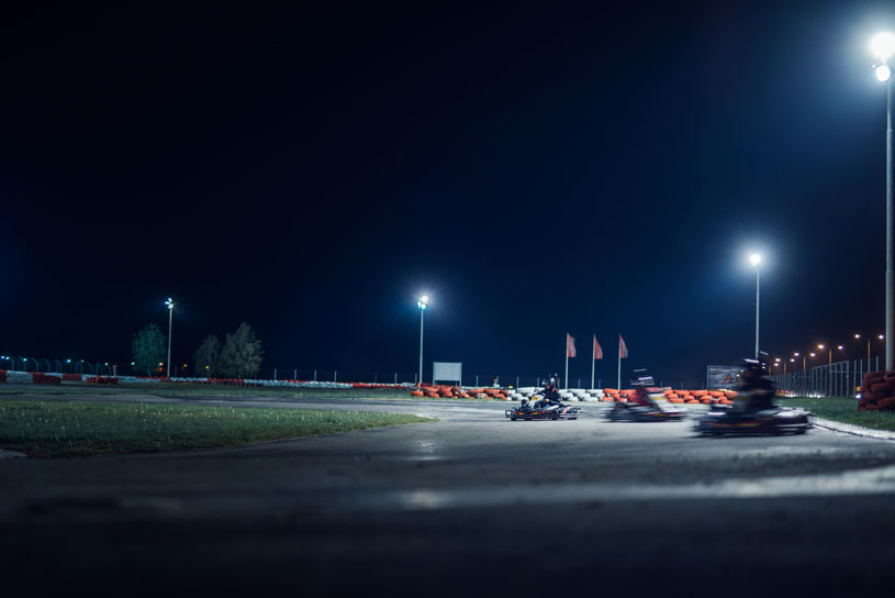 A trio of racers speed through our course during a night race.